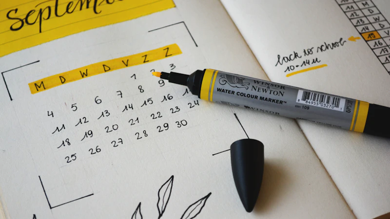 black marker on notebook