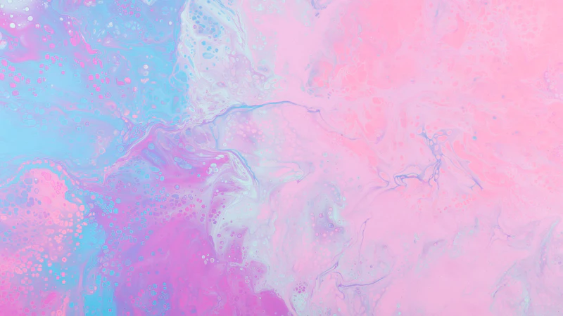 a pink and blue background with a lot of bubbles