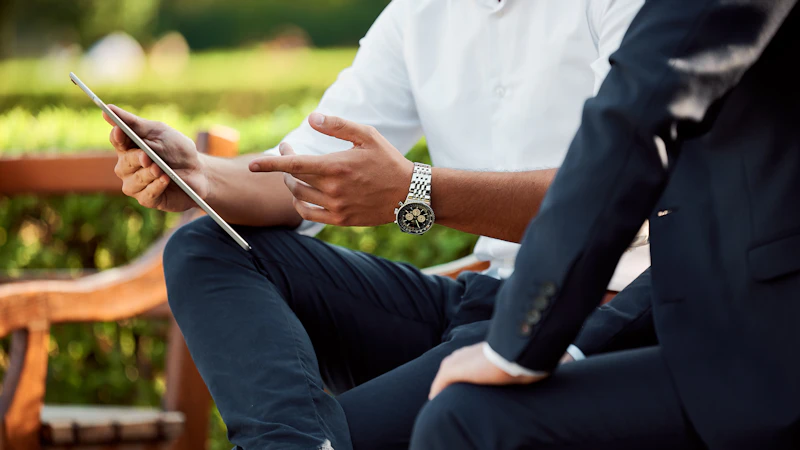 two people sitting during day