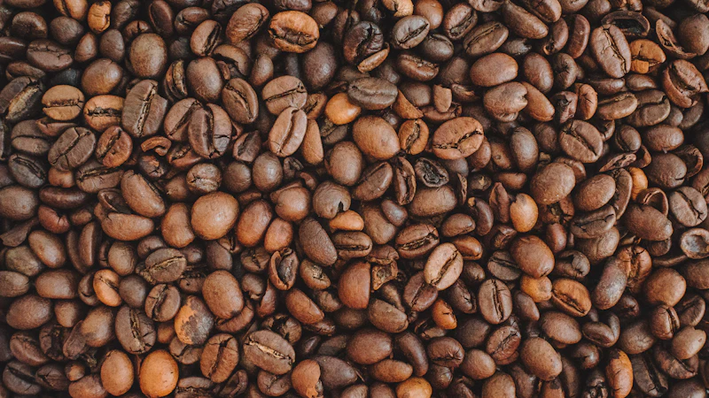brown coffee beans on brown wooden table