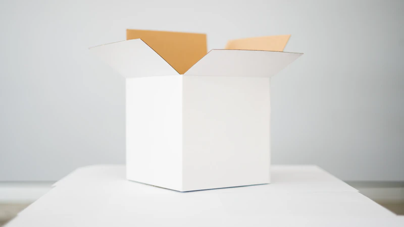white box on white table