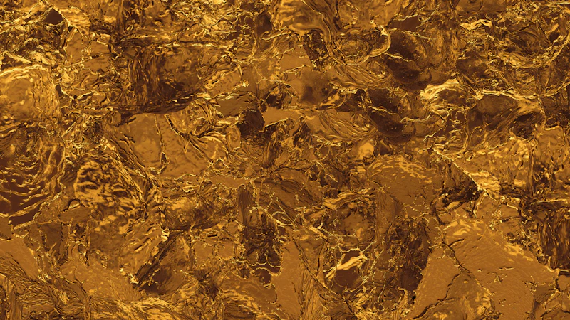 A textured surface of molten gold with irregular ripples and reflective highlights