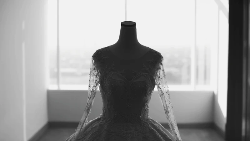 grayscale photo of wedding dress
