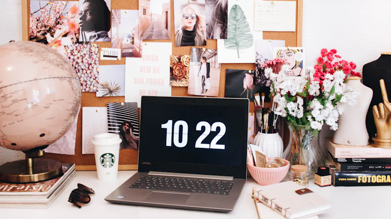black laptop computer on white table