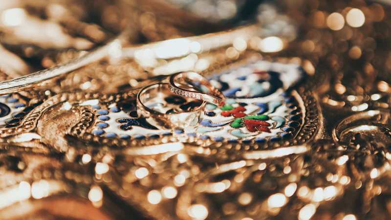 tilt shift lens photo of gold-colored rings