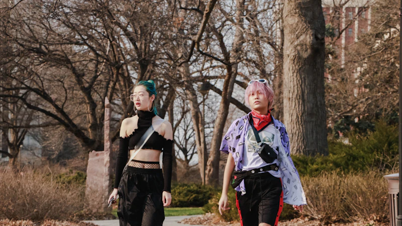 two people walking in the street