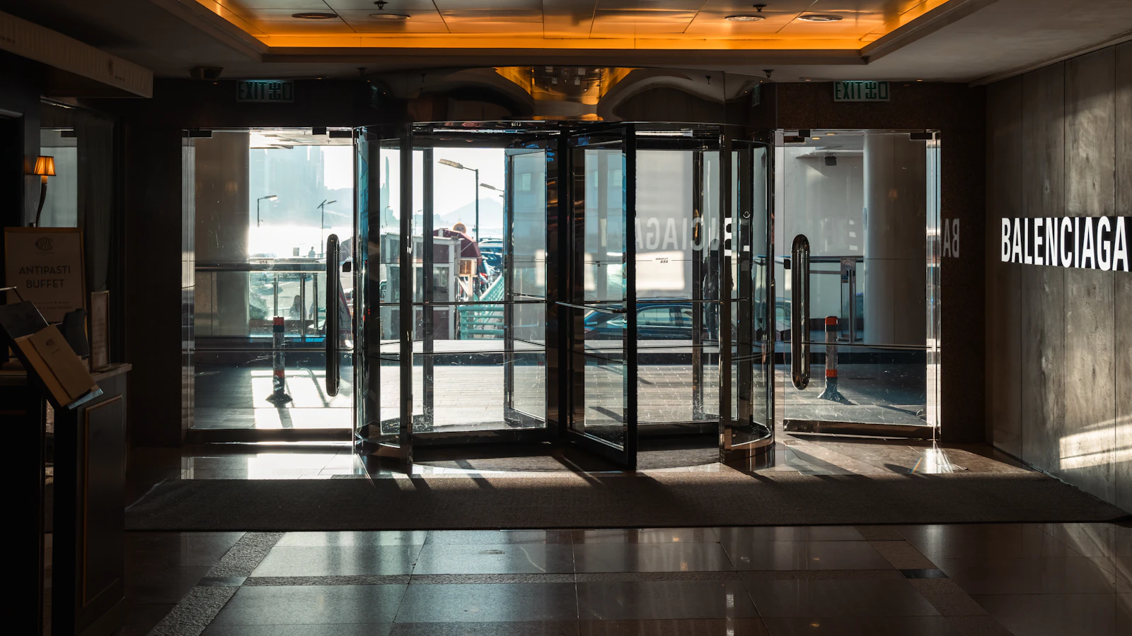 the entrance to a building with glass doors