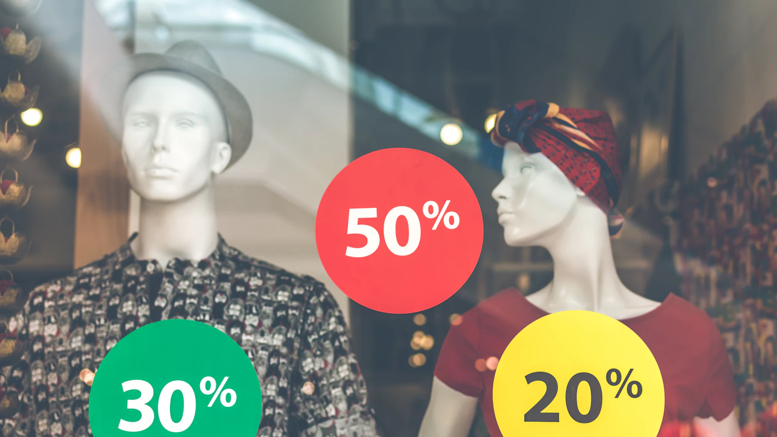 two male and female mannequin wearing clothes