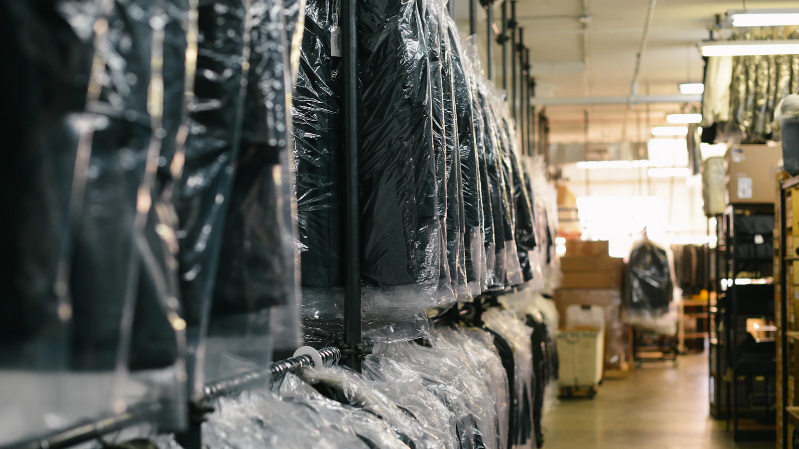 black suit hanging on rack
