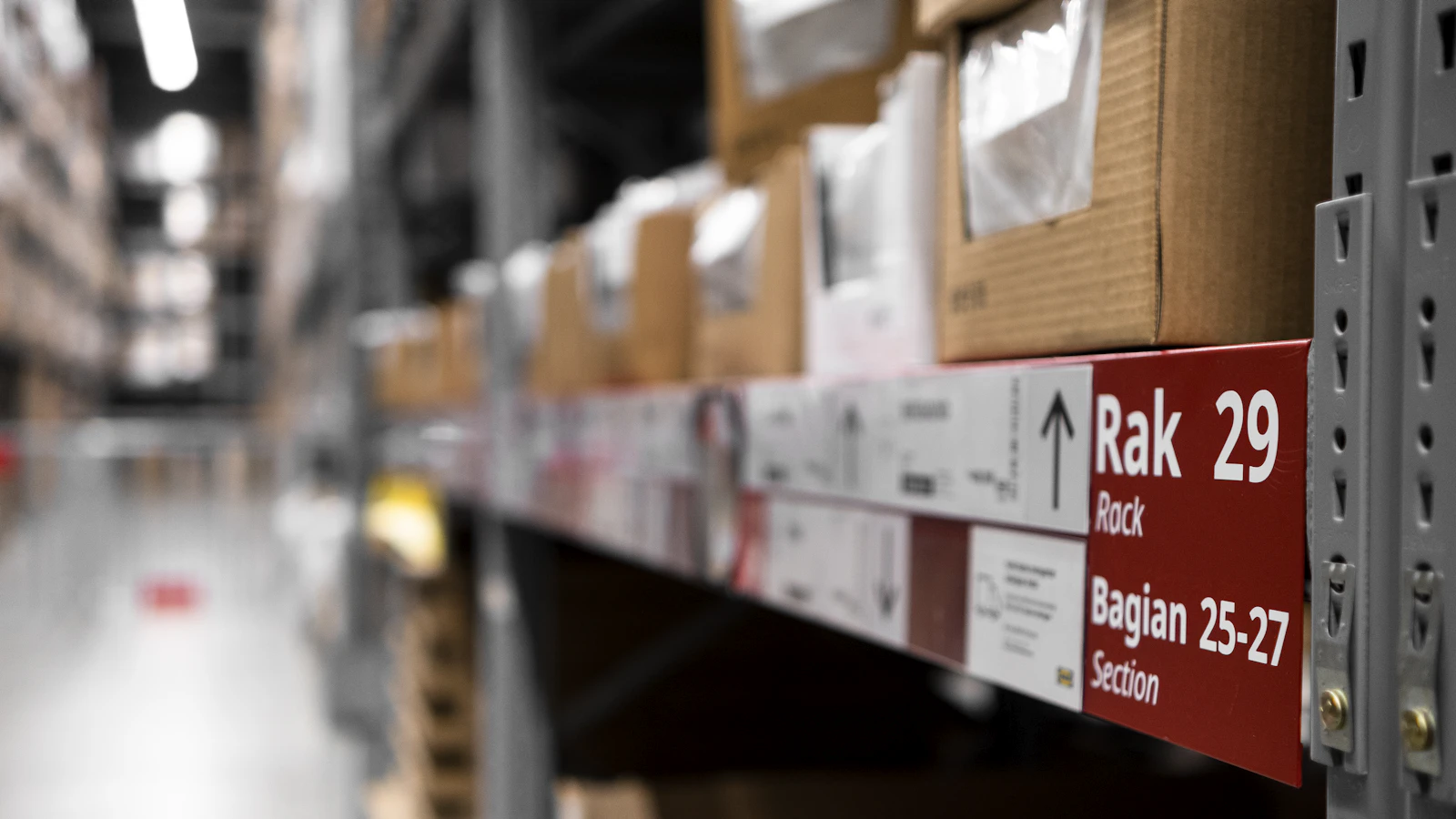 a rack of boxes in a large warehouse