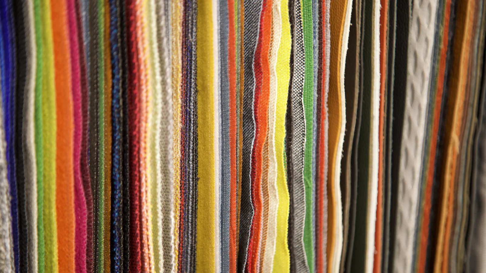 a close up of a bunch of colored pencils