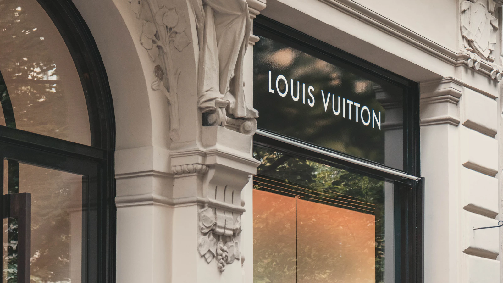 Louis Vuitton boutique signage on building