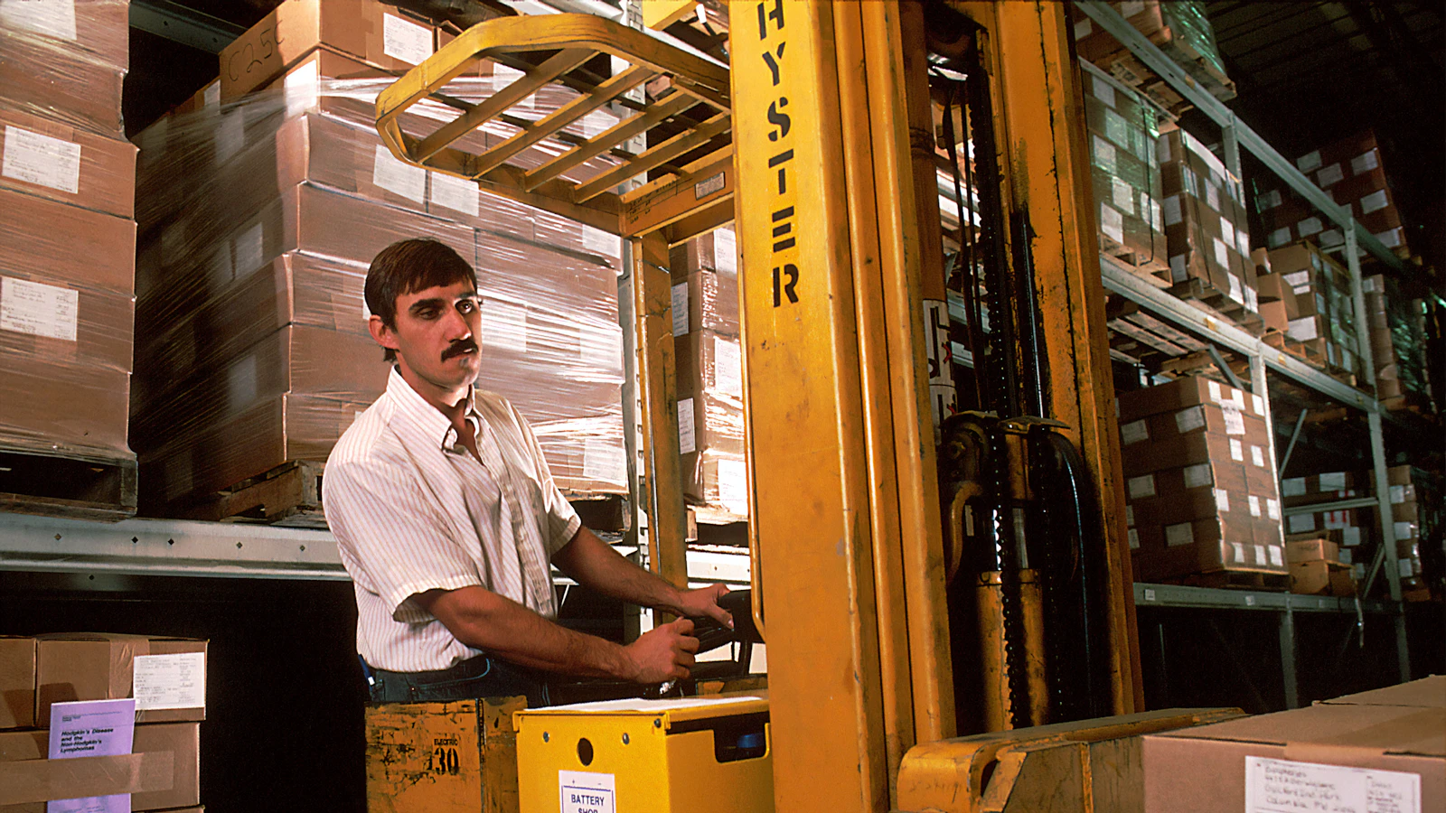 yellow driving forklift
