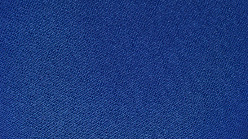 blue textile in close up photography